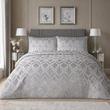 Belfort Velvet silver duvet cover set styled on a neutral bedroom bed