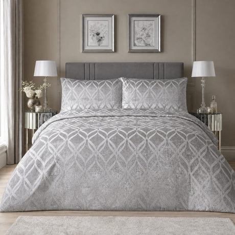 Belfort Velvet silver duvet cover set styled on a neutral bedroom bed