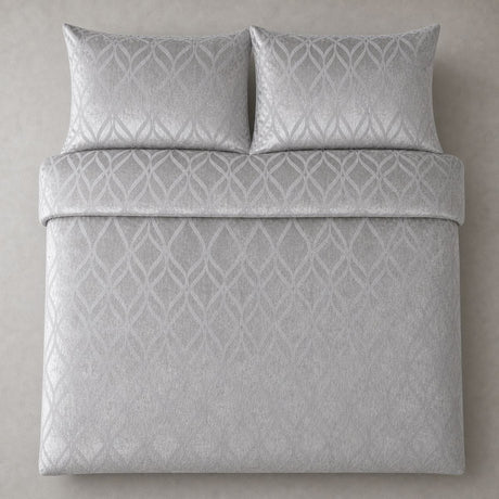 Overhead flat lay of the Belfort Velvet silver duvet cover set with two matching pillowcases