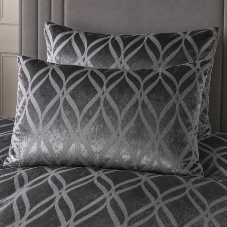 Close-up of Belfort Velvet slate pillowcases showing the raised lattice pattern