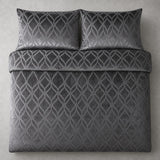 Overhead flat lay of the Belfort Velvet slate duvet cover set with two matching pillowcases