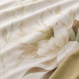 Macro close-up of Brielle Gold cotton duvet cover fabric with magnolia floral detail