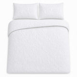Overhead flat lay of the Butterfly Garden white microfibre duvet cover set with two pillows