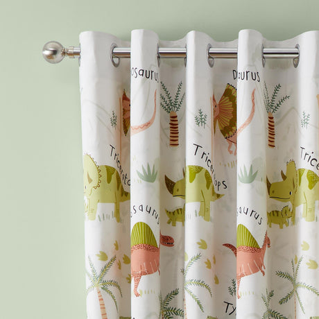 Sleepy Dino Eyelet Curtains by Catherine Lansfield