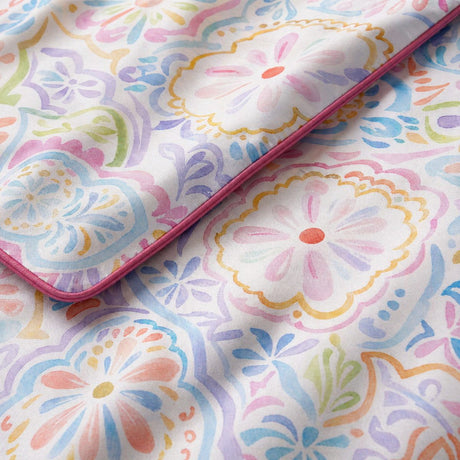 Macro close-up of the Casablanca smooth cotton duvet cover fabric with pastel paisley detail