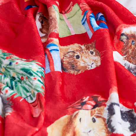 Christmas Guinea Pig Throw by Catherine Lansfield