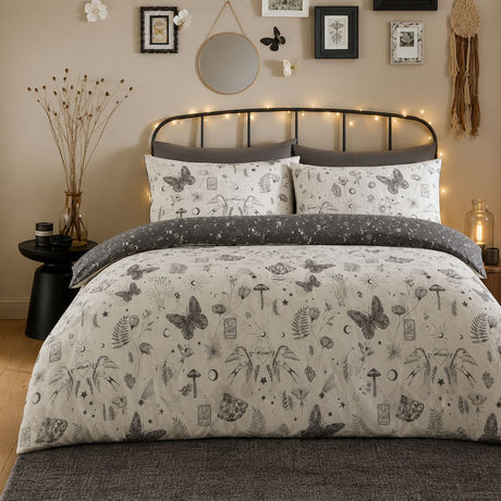 Celeste Polycotton Duvet Cover Set in grey styled on a coordinated bedroom bed