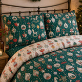 Close-up of Christmas Ornaments Polycotton Duvet Cover Set in green pillowcases showing the print and fabric detail