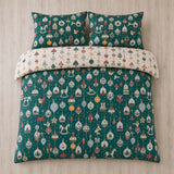Overhead flat lay of the Christmas Ornaments Polycotton Duvet Cover Set in green with two matching pillowcases