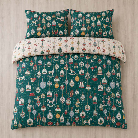 Overhead flat lay of the Christmas Ornaments Polycotton Duvet Cover Set in green with two matching pillowcases