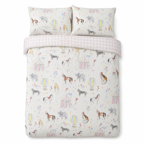 Overhead flat lay of the Circus Time Kids Microfibre Duvet Cover Set in multi with two matching pillowcases