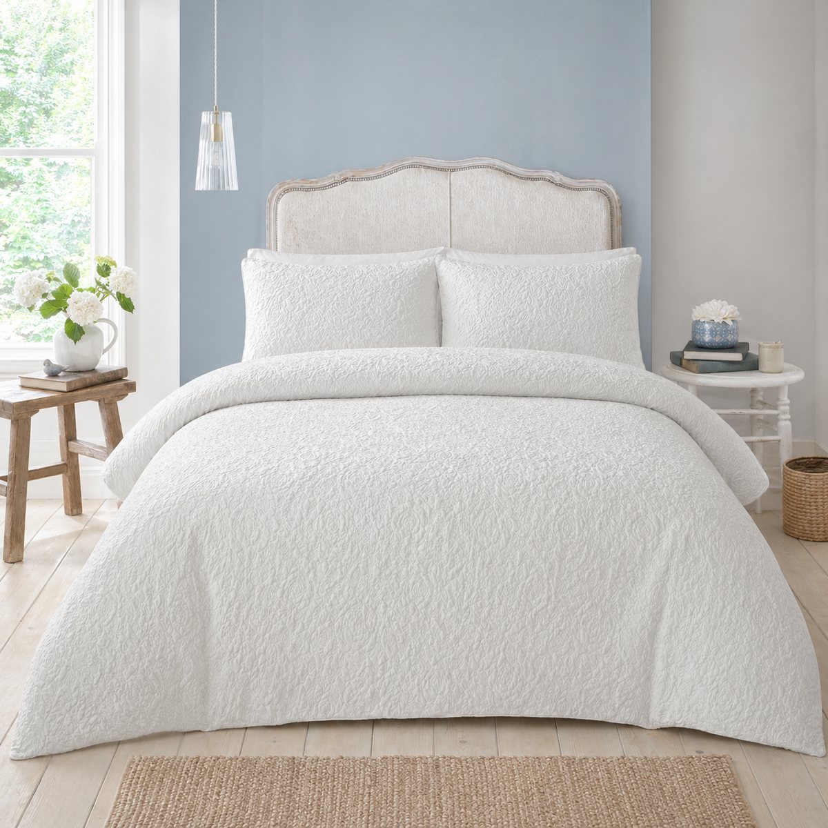 Collier white jacquard floral duvet cover set styled on a fresh bright bedroom bed