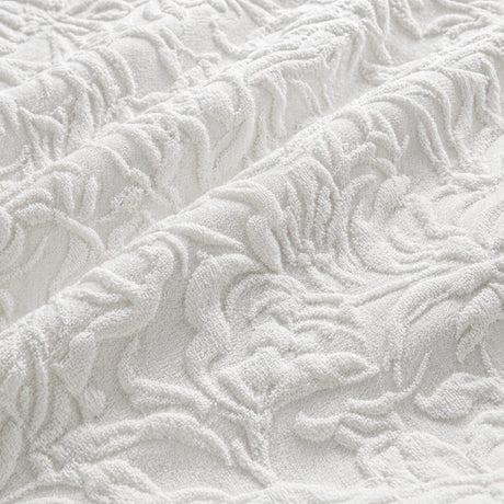Macro close-up of the white Collier jacquard floral duvet cover fabric texture