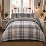 Colville Check grey brushed cotton flannelette duvet cover set styled on a cosy bedroom bed