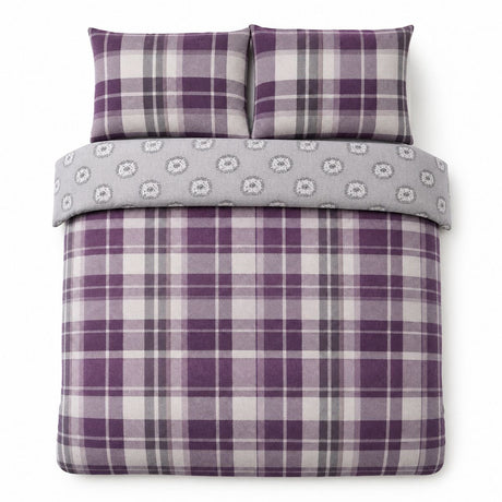 Overhead flat lay of the Colville Check plum duvet cover set with two matching pillowcases