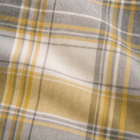 Macro close-up of the Connolly ochre brushed cotton flannelette check fabric