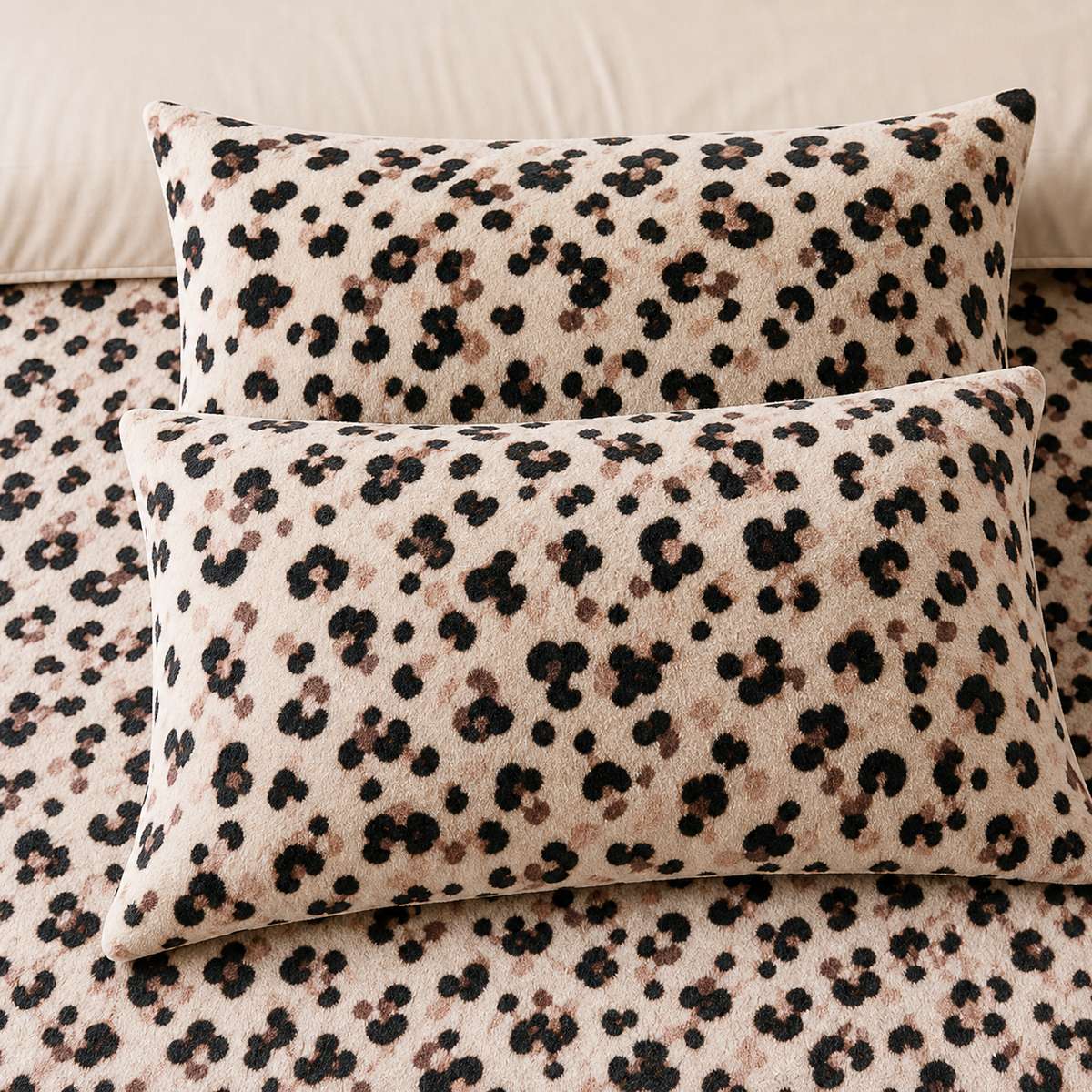 Close-up of Cosy Leopard Microfibre Duvet Cover Set in natural pillowcases showing the print and fabric detail