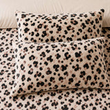 Close-up of Cosy Leopard Microfibre Duvet Cover Set in natural pillowcases showing the print and fabric detail