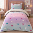 Cosy Ombre Heart Kids Duvet Cover Set styled on a bed in a coordinated bedroom lifestyle scene
