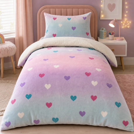 Cosy Ombre Heart Kids Duvet Cover Set styled on a bed in a coordinated bedroom lifestyle scene