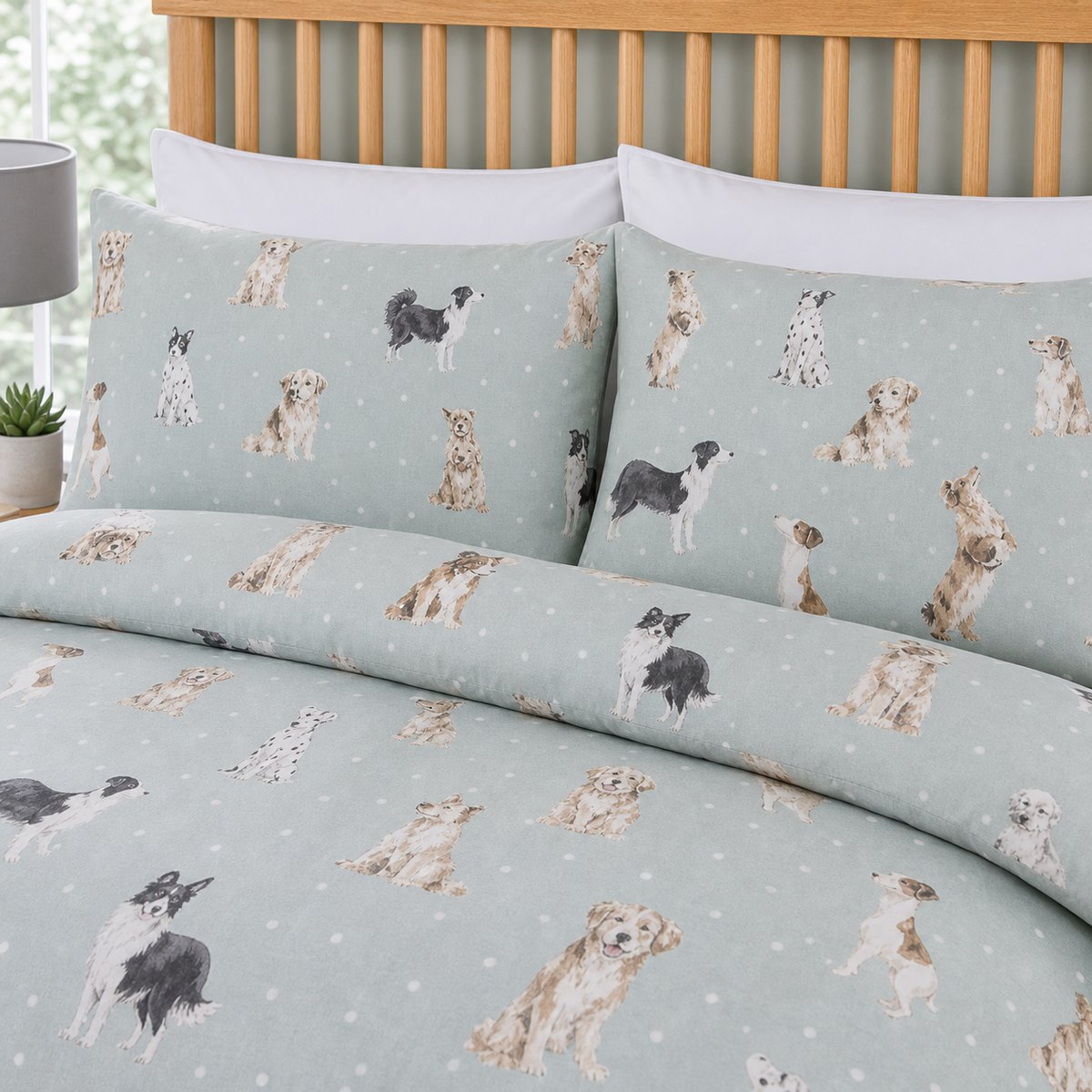 Close-up of matching Cute Dogs Polycotton Duvet Cover Set pillowcases showing the pattern and fabric detail