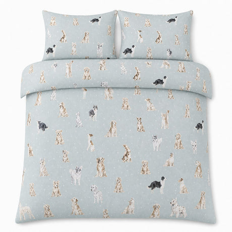 Overhead flat lay of the Cute Dogs Polycotton Duvet Cover Set with two matching pillowcases