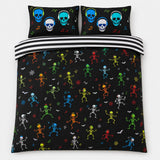 Overhead flat lay of the Dancing Skeletons Halloween duvet cover set with striped reverse