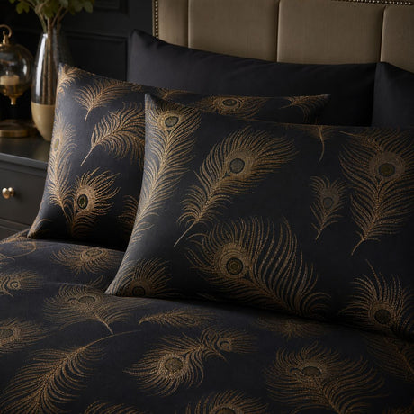 Close-up of Dandy Black jacquard pillowcases showing the peacock feather pattern