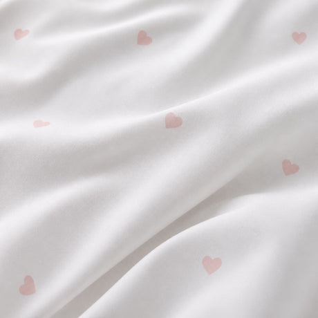 Macro close-up of the smooth Decorative Heart Blush microfibre fabric
