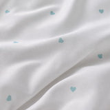 Macro close-up of the smooth Decorative Heart Duck Egg microfibre fabric