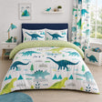 Dino Dinosaur Kids Reversible Duvet Cover Set styled on a bed in a coordinated bedroom lifestyle scene