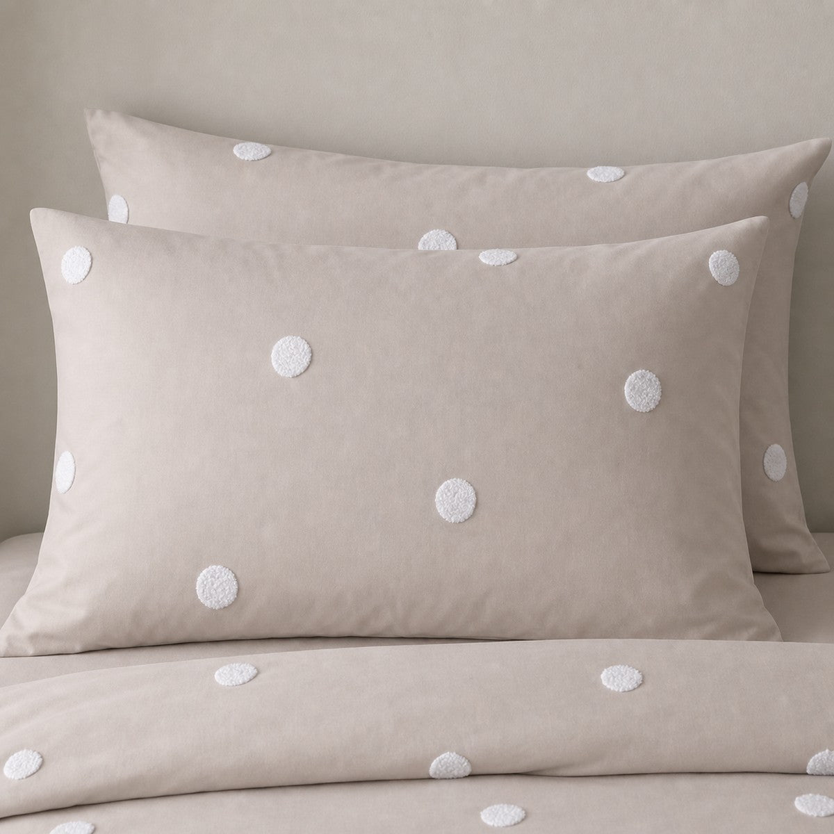 Close-up of Dot Garden Cotton Duvet Cover Set in linen pillowcases showing the print and fabric detail