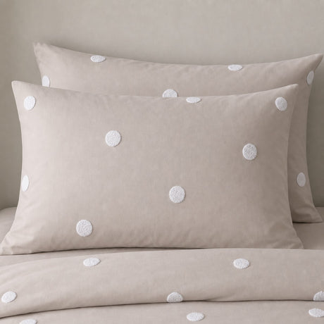 Close-up of Dot Garden Cotton Duvet Cover Set in linen pillowcases showing the print and fabric detail