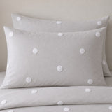 Close-up of Dot Garden Cotton Duvet Cover Set in silver pillowcases showing the print and fabric detail