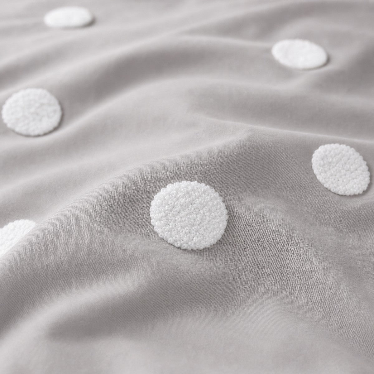 Macro close-up of the silver fabric on the Dot Garden Cotton Duvet Cover Set