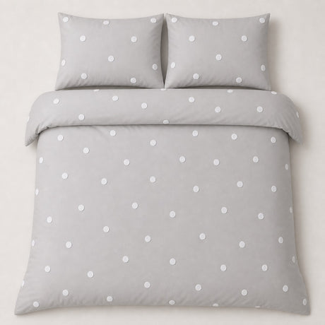 Overhead flat lay of the Dot Garden Cotton Duvet Cover Set in silver with two matching pillowcases