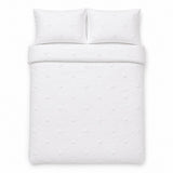 Overhead flat lay of the Dot Garden Cotton Duvet Cover Set in white with two matching pillowcases