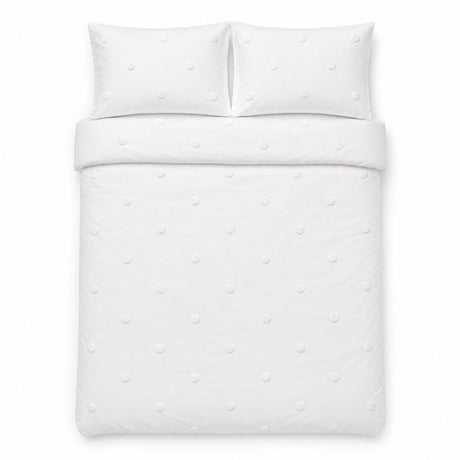 Overhead flat lay of the Dot Garden Cotton Duvet Cover Set in white with two matching pillowcases
