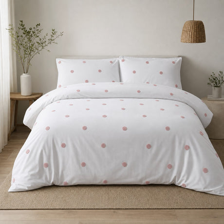 Dot Garden Cotton Duvet Cover Set in white + pink styled on a coordinated bedroom bed