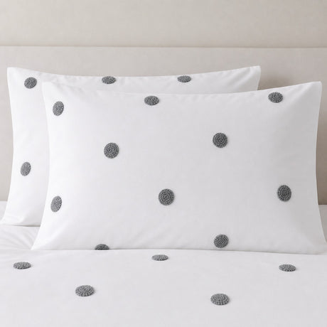 Close-up of Dot Garden Cotton Duvet Cover Set in white + slate pillowcases showing the print and fabric detail