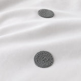 Macro close-up of the white + slate fabric on the Dot Garden Cotton Duvet Cover Set