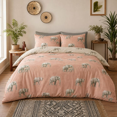 Ella the Elephant natural reversible duvet cover set styled on a warm bedroom bed