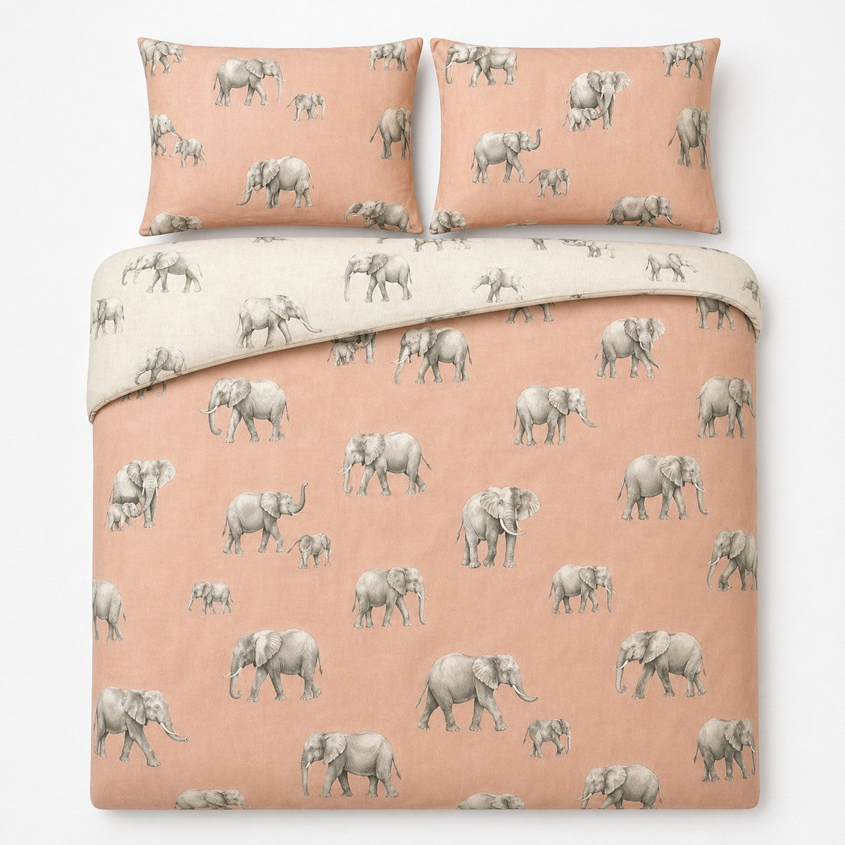 Overhead flat lay of the Ella the Elephant reversible duvet cover set with two pillows