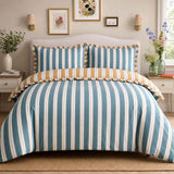 Eloise Stripe Cotton Duvet Cover Set in teal styled on a coordinated bedroom bed