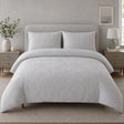 Embossed Geo Microfibre Duvet Cover Set in grey styled on a coordinated bedroom bed