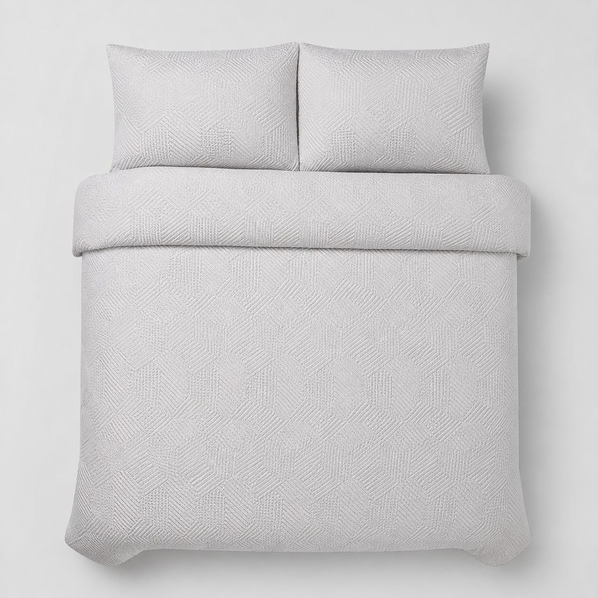 Overhead flat lay of the Embossed Geo Microfibre Duvet Cover Set in grey with two matching pillowcases