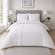 Embroidered Band silver cotton duvet cover set styled on a clean white bedroom bed