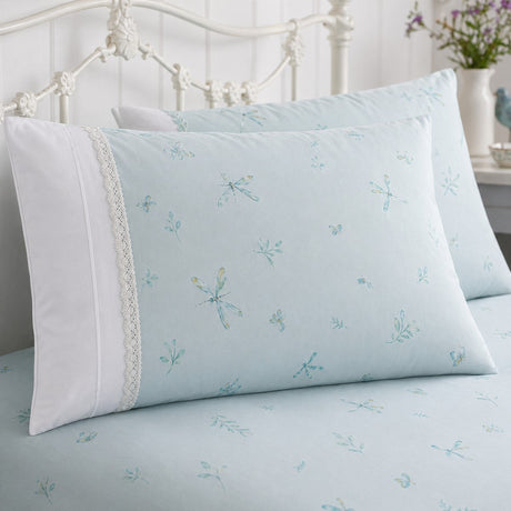 Close-up of Fifi duck egg botanical pillowcases showing the delicate print and lace trim
