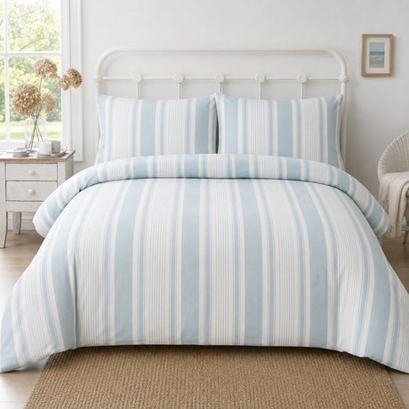 Finlay Stripe Polycotton Duvet Cover Set in blue styled on a coordinated bedroom bed