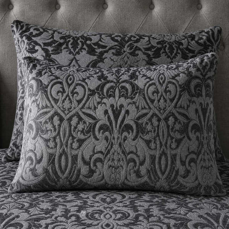 Close-up of Firenza Slate velvet jacquard pillowcases showing the raised damask pattern